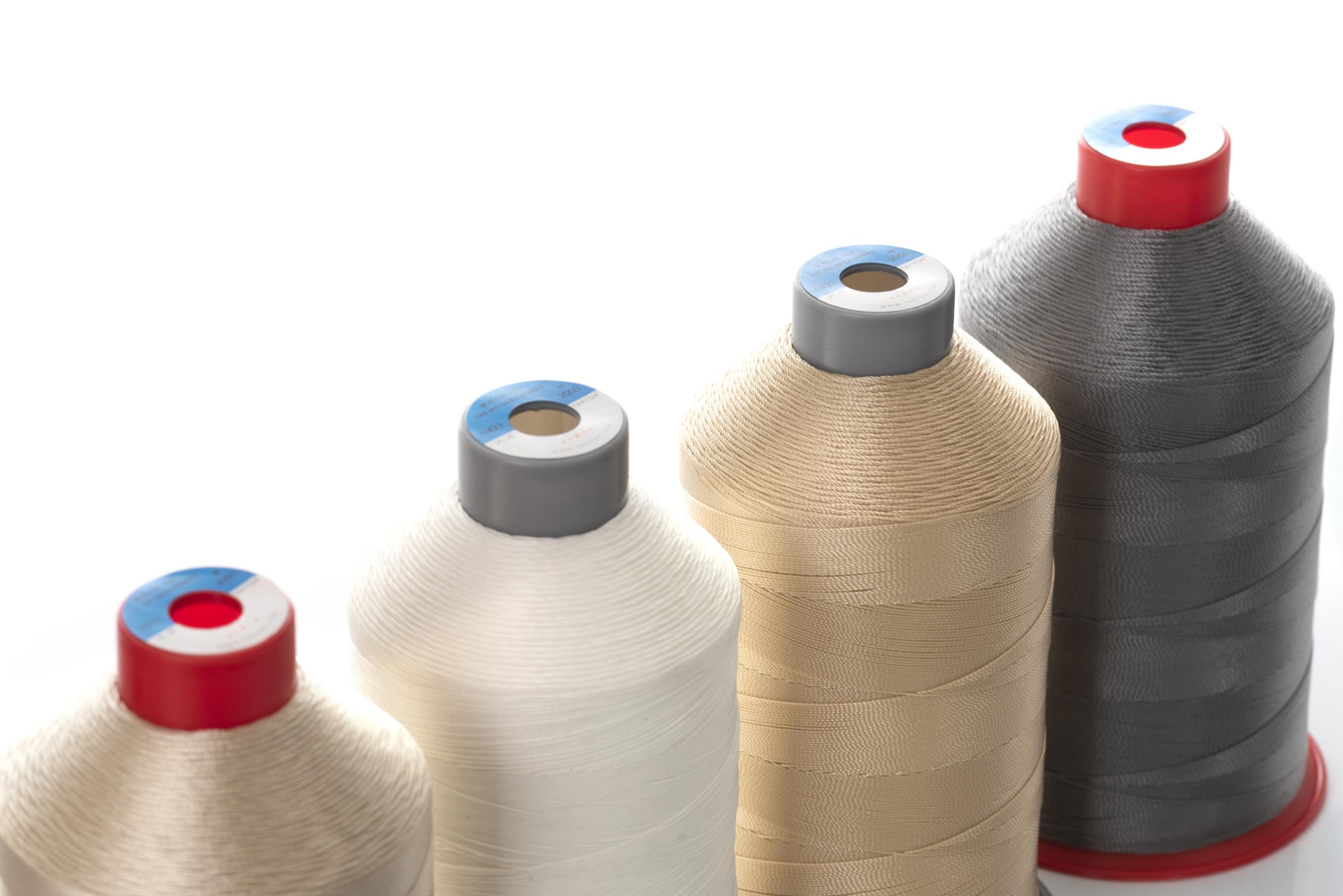 Filament bonded polyester sewing thread