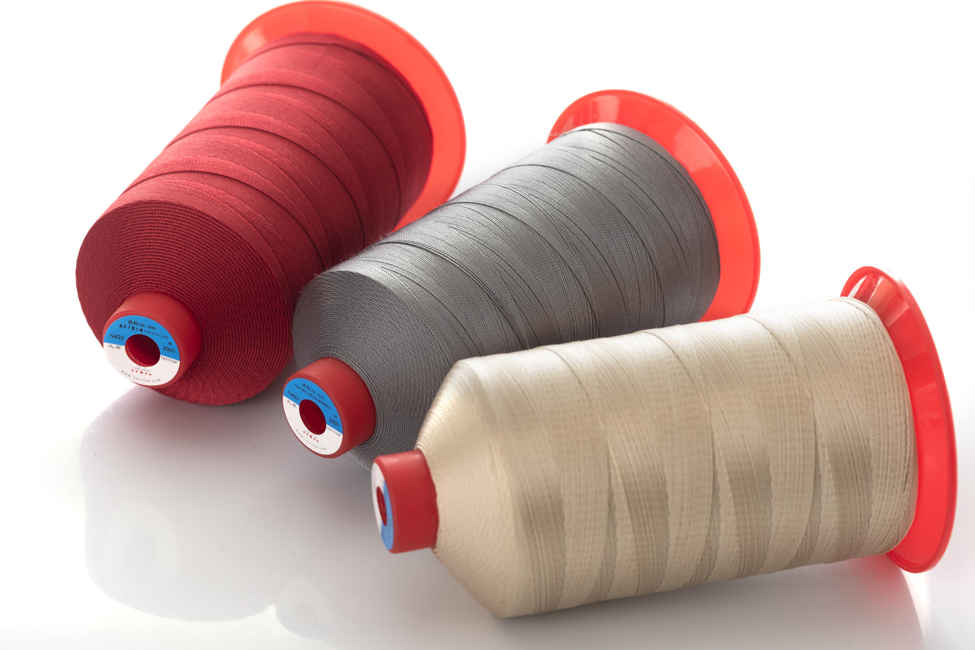 Filament bonded nylon 6.6 sewing thread