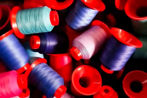 ‌Why Filament Polyester and Nylon Sewing Thread Sometimes Require an Additional Bonding Process